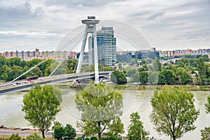 Bratislava, Slovakia - August 23, 2022: Bridge SNP and UFO tower view point over Danube river in Bratislava city, Slovakia