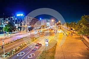 Bratislava, Slovakia - August 23, 2022: City street along the Danube River at night