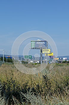 Bratislava, Slovakia - August, 4, 2022 : The spatial visual pollution. Excessive Outdoor Advertisements and billboards lining the