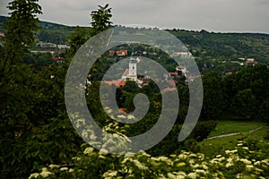 BRATISLAVA, SLOVAKIA: Beautiful landscape with hills, trees, meadows and village houses near the fortress- Devin Castle