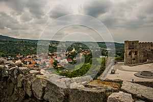 BRATISLAVA, SLOVAKIA: Beautiful landscape with hills, trees, meadows and village houses near the fortress- Devin Castle