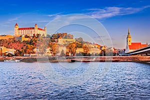 Bratislava, Slovakia. Bratislava Castle and old town over Danube River, sunrise light