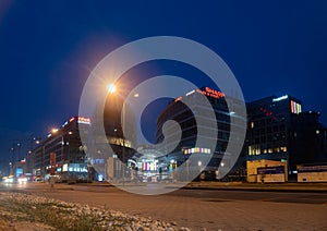 BRATISLAVA, SLOVAKIA - JULY 11, 2021: View of the traffic on streets of Bratislava at night next to the Eurovea