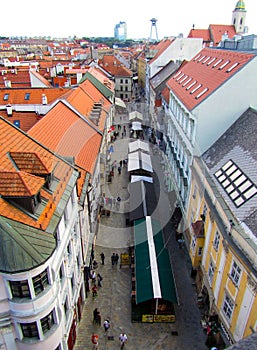 Bratislava, Slovakia top view of the old city. Beautiful roofs of tiled houses, street, small market