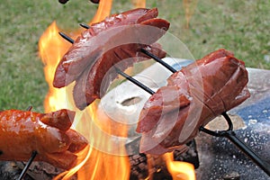 Bratwurst preparing on the fire