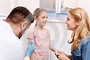 Brave child patient looking at her mother