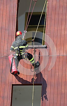brave climber of the fire brigade during an exercise to access t