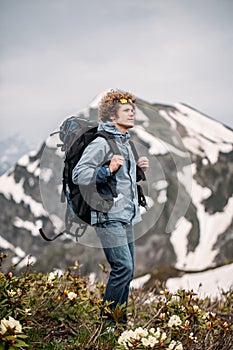 Brave climber has ascended the mountain photo