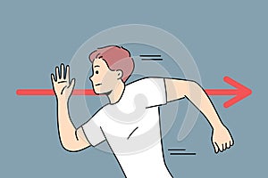 Brave man runs in opposite direction near red arrow, demonstrating rebellion and non-conformity photo