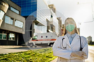 Brave optimistic paramedic in the front lines,working in a isolation hospital facility with infected patients.Covid-19 emergency