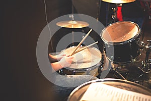 Brawling installation with a drummer and drumsticks, to create a rhythm musical performance