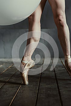 Brawny ballet dancer legs in pointes