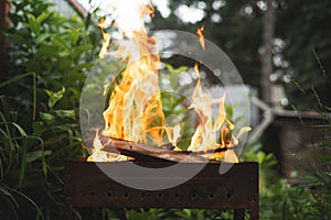 Brazier with burning fire photo