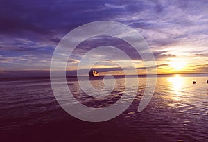 Brazil: Amazonas-cruiseship at sunset near the delta photo