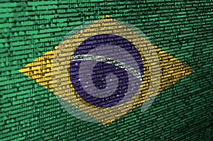 Brazil flag is depicted on the screen with the program code. The concept of modern technology and site development photo