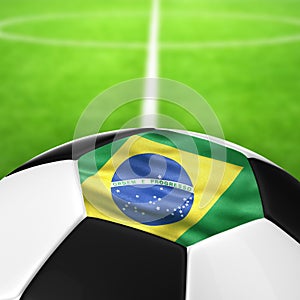 Brazil Flag Pattern of a soccer ball in green grass.