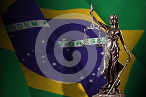 Brazil flag with statue of lady justice and judicial scales in dark room. Concept of judgement and punishment