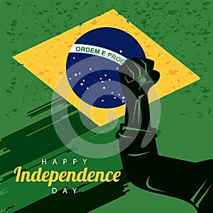 Brazil happy independece day celebration with flag and hand fist