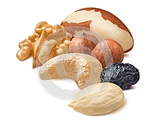 Brazil nut, walnut, hazelnut, blanched almond, cashew and raisin isolated on white background photo