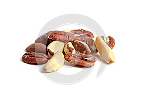 Brazil nuts and peeled pecans mix isolated on white background. Nutty goodness