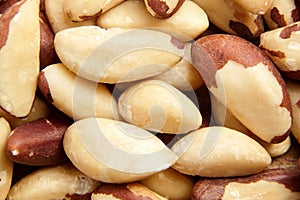 Brazil nuts texture background closeup. Shelled nuts, top view. Organic Brazil nuts, a plant-based treat
