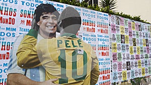 Mural depicting Brazilian soccer legend Pele embracing late Argentinean soccer star Diego Maradona