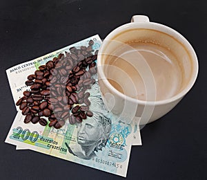 Brazil roasted coffee beans placed on banknotes