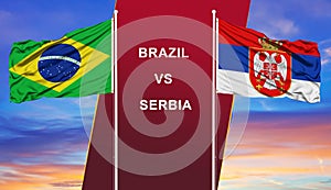Brazil vs. Serbia two flags on flagpoles and blue cloudy sky
