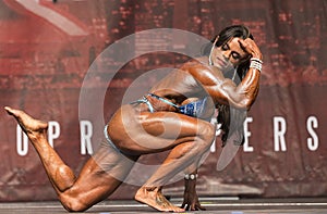 Brazilian Beauty Displays Muscle at Toronto Contest