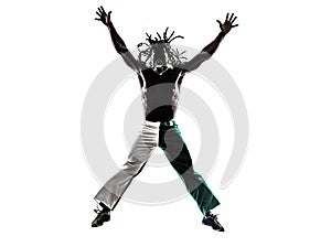 Brazilian black man jumping arms outstretched silhouette