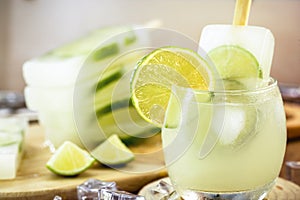 Brazilian caipirinha in popsicle, typical Brazilian cocktail made with lemon, cachaÃ§a and sugar. Traditional summer drink from