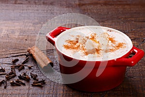 Brazilian dessert canjica of white corn with cinnamon