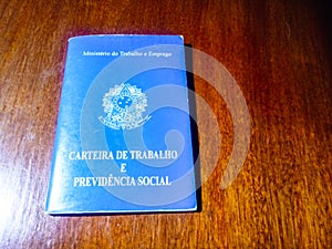 Brazilian document work and social security on wooden table