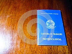 Brazilian document work and social security on wooden table