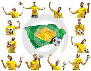 Brazilian fan celebrating on white background. The young man in soccer football uniform with ball standing at white