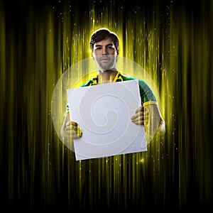 Brazilian fan holding white empty board