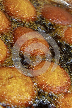 Brazilian food: acaraje fried on the board of baiana