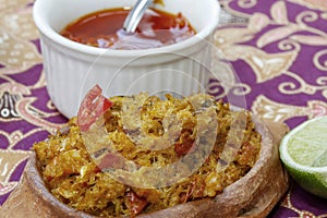 Brazilian food: casquinha de siri and pepper pots photo