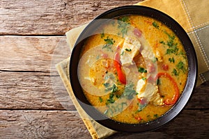 Brazilian food: Moqueca Baiana of fish and bell peppers in spicy