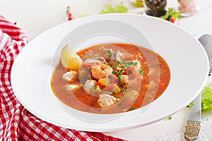 Brazilian food: Moqueca capixaba of fish and bell peppers photo