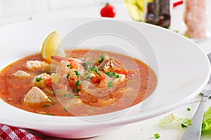 Brazilian food: Moqueca capixaba of fish and bell peppers photo