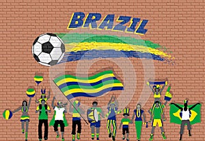 Brazilian football fans cheering with Brazil flag colors in front of soccer ball graffiti
