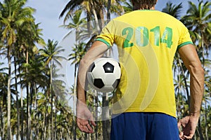 Brazilian Football Player Holding Soccer Ball Palm Trees