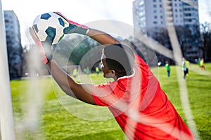 brazilian football player on stadium kicking ball for winning goal outdoors