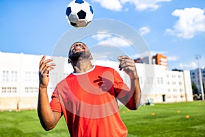 brazilian football player on stadium kicking ball for winning goal outdoors