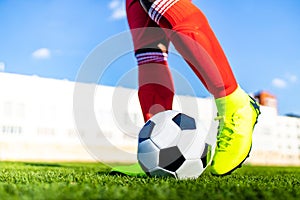 brazilian football player on stadium kicking ball for winning goal outdoors