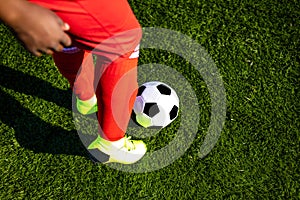 brazilian football player on stadium kicking ball for winning goal outdoors