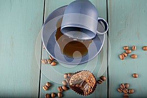 Brazilian fudge ball, traditional Brazilian sweet, next to cup and coffee beans_17