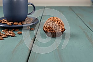 Brazilian fudge ball, traditional Brazilian sweet, next to cup and coffee beans_4
