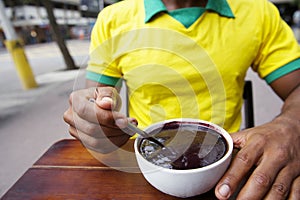 Brazilian Man Eating Bowl of Acai AÃ§aÃ­